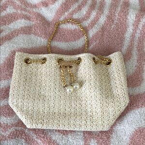 Elegant Cream Woven Handbag with Gold Accents